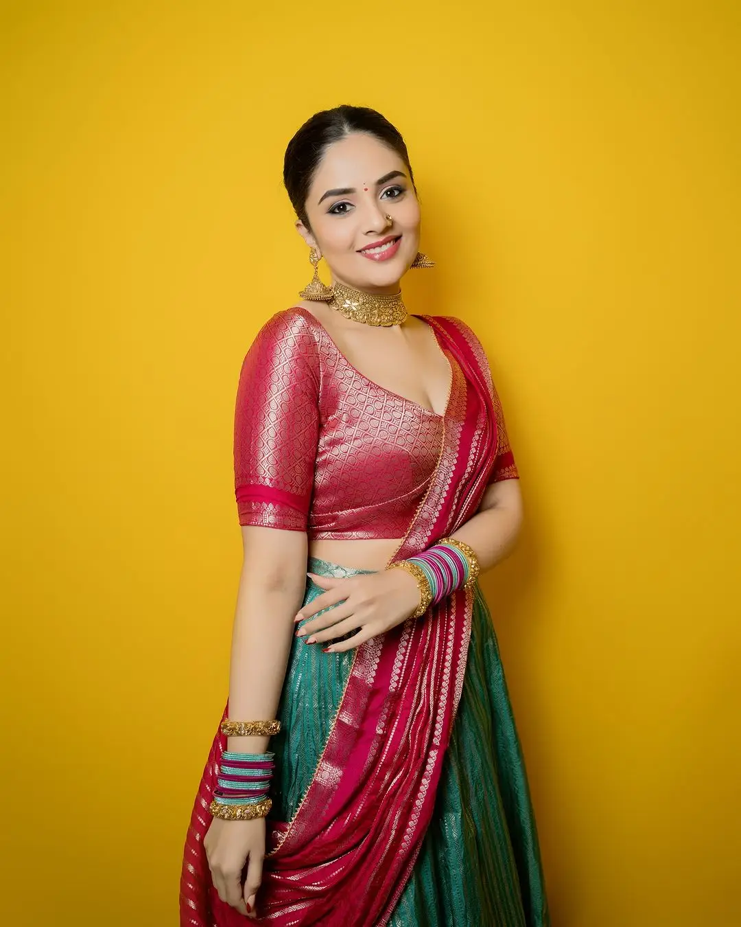 Telugu Actress Sreemukhi Stills In Green Lehenga Choli